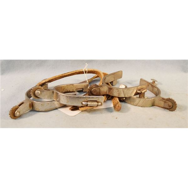 2 items: Crockett silver mounted spurs & Crockett Renalde spurs