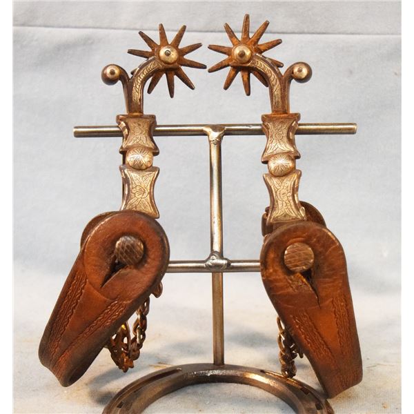 Fancy inlaid silver spurs