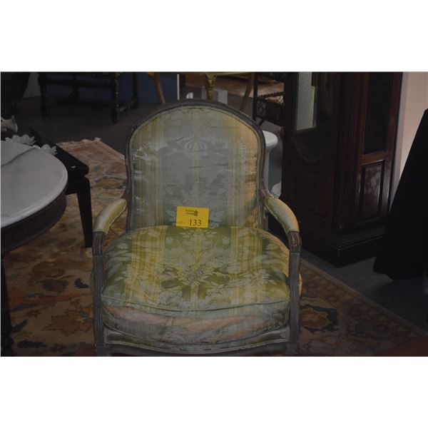 ANTIQUE UPHOLSTERED ARM CHAIR
