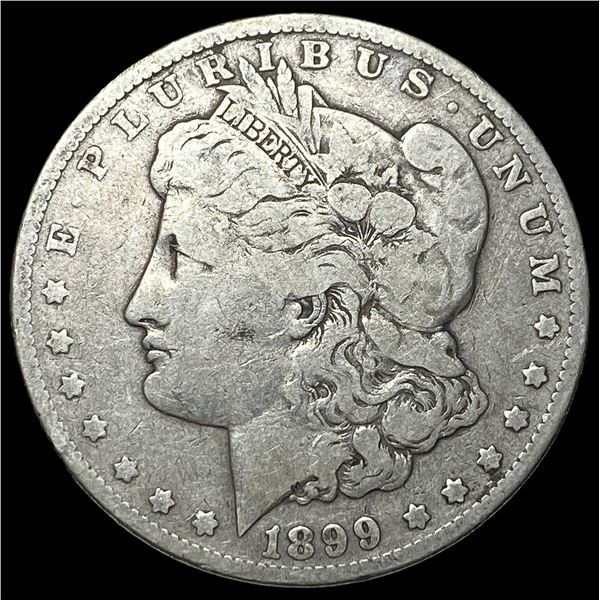 1899 Silver Morgan Dollar ABOUT UNCIRCULATED
