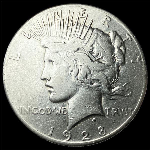 1928 Silver Peace Dollar ABOUT UNCIRCULATED