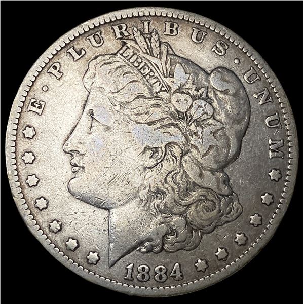 1884 Silver Morgan Dollar ABOUT UNCIRCULATED