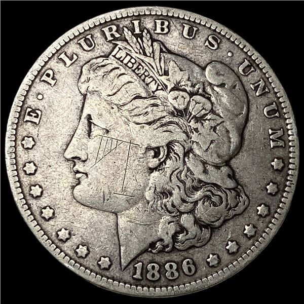 1886 Morgan Silver Dollar ABOUT UNCIRCULATED