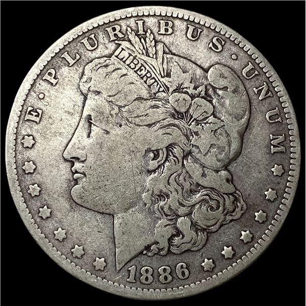 1886-O Silver Morgan Dollar ABOUT  UNCIRCULATED