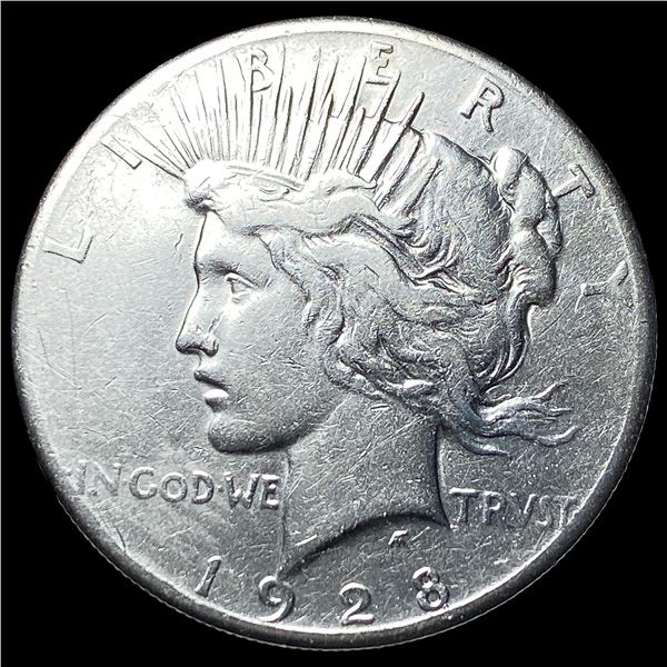 1928 Silver Peace Dollar ABOUT UNCIRCULATED