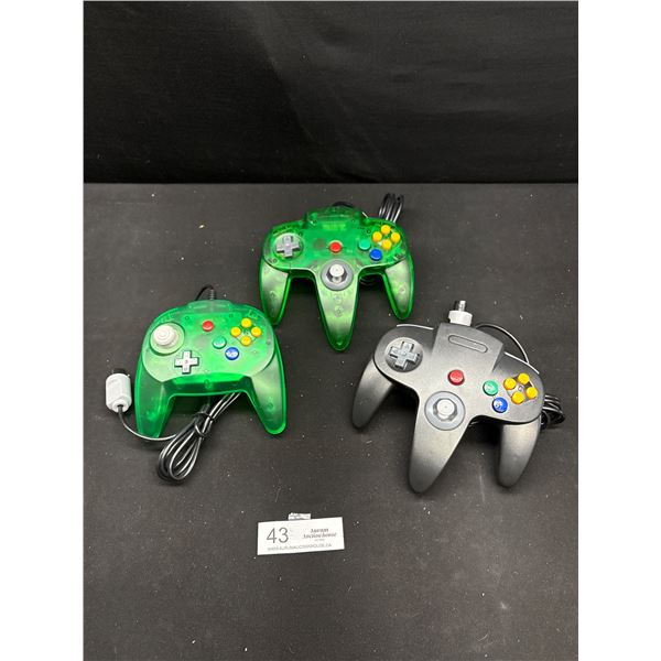 Lot of 3 Nintendo 64 Controllers 2 Green 1 Black