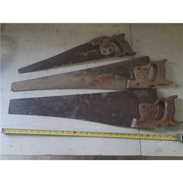 (3) Vintage hand saws.