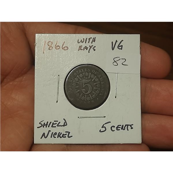 1866 With Ras Shield Nickel.