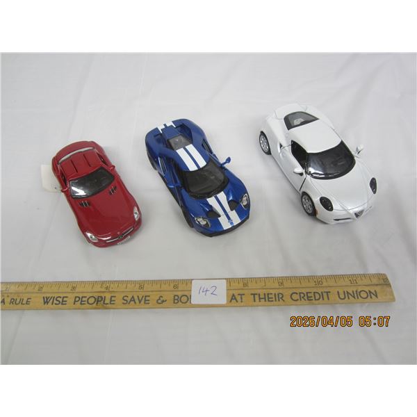 142. 3 Die Cast Cars Mercedes, GT40, Alfa Romao Like New Condition