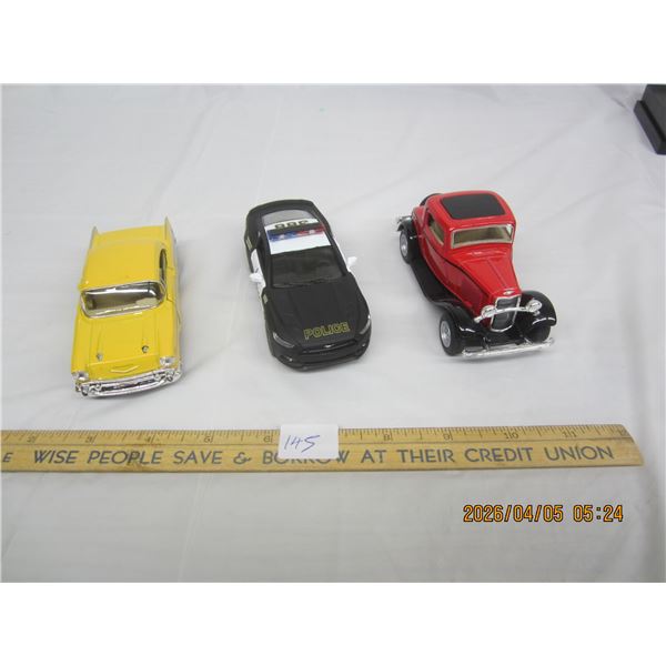 145. 3 Die Cast Cars 57 Chevy Yellow, Model T, Mustang Like New Condition