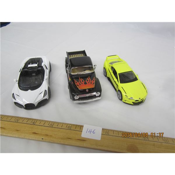 146. 3 Die Cast Cars and Truck BMW, Merc Truck, Bugatti