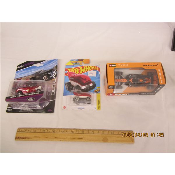 148. Lot of 3 Die Cast Cars McLaren Race Car, Hot Wheels ,1932 Ford Roadster in Original Packaging