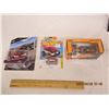Image 1 : 148. Lot of 3 Die Cast Cars McLaren Race Car, Hot Wheels ,1932 Ford Roadster in Original Packaging