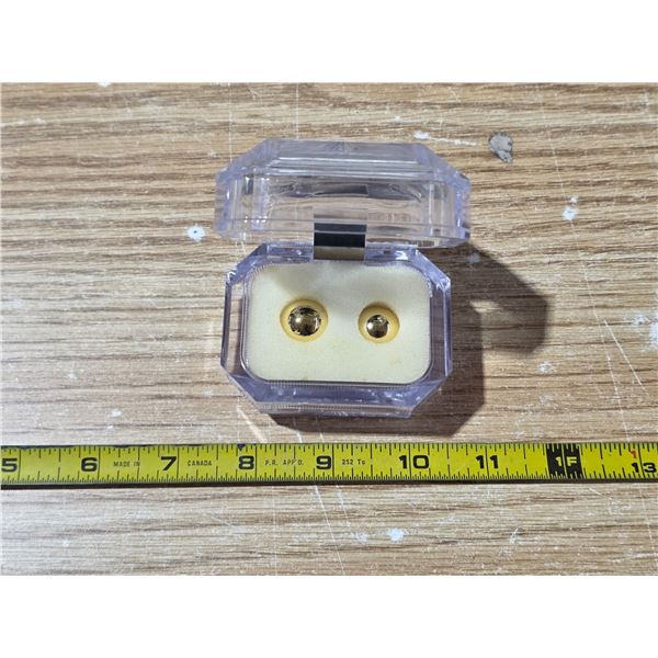 2 marbles- gold colored