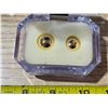 Image 2 : 2 marbles- gold colored