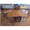 Image 1 : Oak dining room table with 2 leafs and 6 matching chairs - 40" by 50" by 29"H