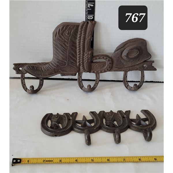 Cast iron western wall hooks.