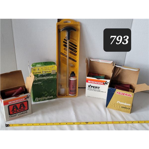 Gun cleaning kit & empty shot gun shells.