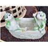 Image 2 : Basket of outdoor yard decor.