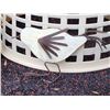 Image 8 : Basket of outdoor yard decor.