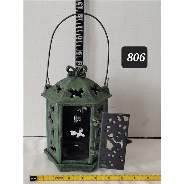 Cast iron candle lamp.