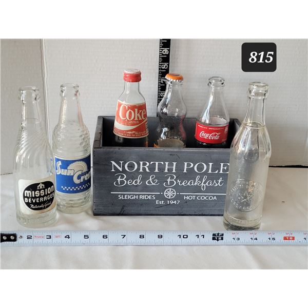 Vintage soda bottles. Starlight Bottlers (Saskatoon), Mission & Suncrest, plus 3 ukraine sodas.