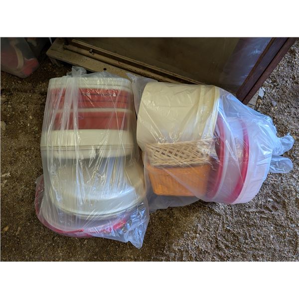 (2) Bags full of Misc. Tupperware and Tins and etc. As Shown