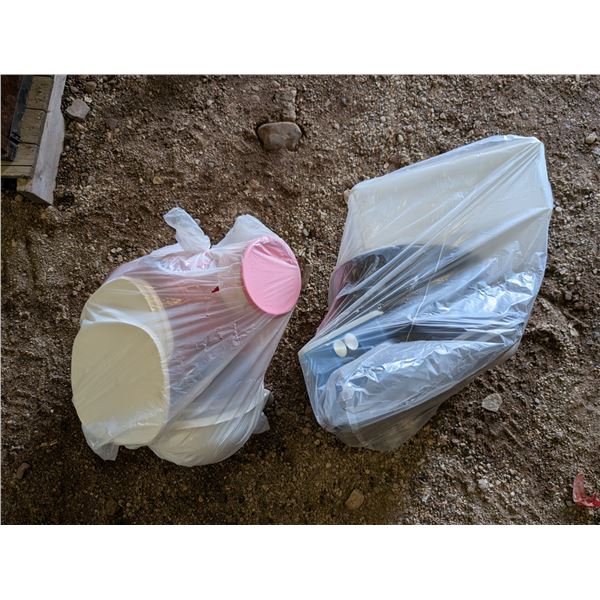 (2) Bags full of Misc. Tupperware and Tins and etc. As Shown