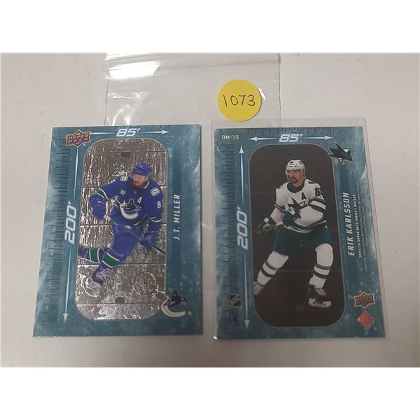 2023-24 Upper Deck Series 1 Hockey - J. T. Miller and Erik Karlsson.