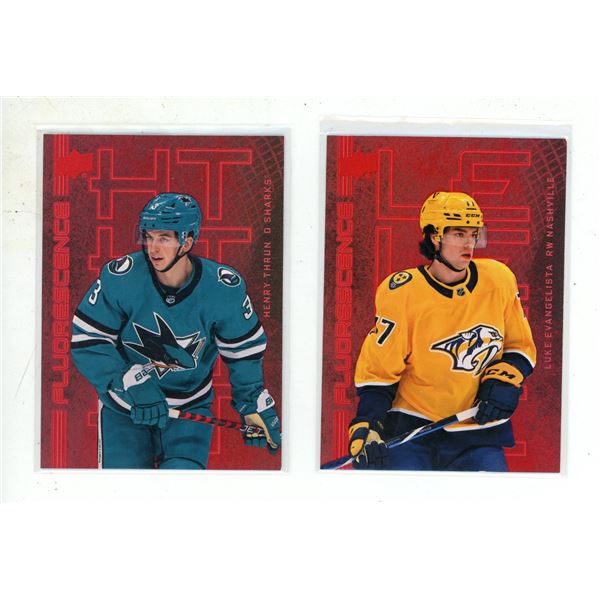 2023-24 Upper Deck Series 2 Hockey - Henry Thrun and Luke Evangelista.