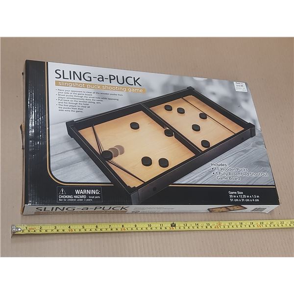 Sling-a-Puck Game.