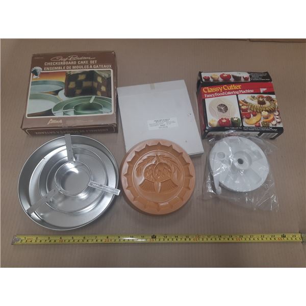 Vintage baking tools include sets for creating patterned cakes and specialized food cutting.