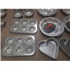 Image 3 : Set of various aluminum baking molds and tins.