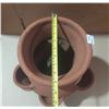 Image 4 : Terracotta strawberry pot with multiple side openings.