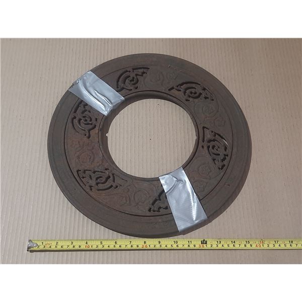 Antique cast iron floor grate or stove pipe register, likely dating from the late 19th or early 20th
