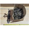 Image 1 : Shell casing and cast iron hanger
