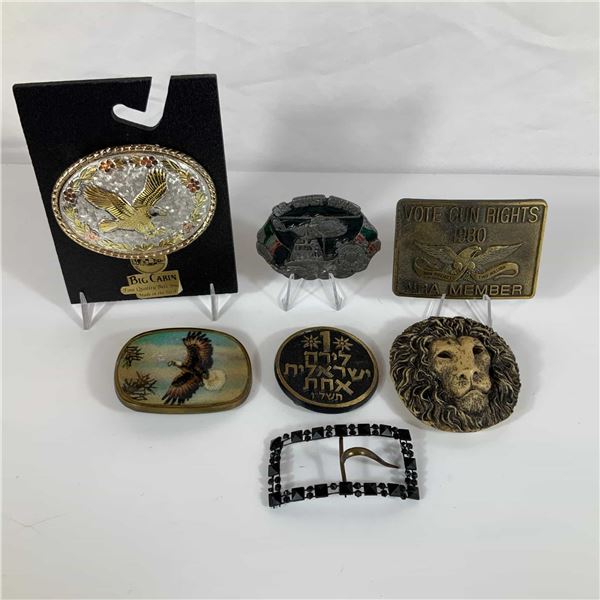 A Collection of 7 Vintage Metal and Resin Belt Buckles Including Big Cabin and NRA