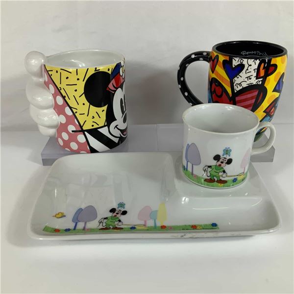 A Collection of Disney Ceramic Tableware Including Romero Britto Mugs and a Vintage Snack Set