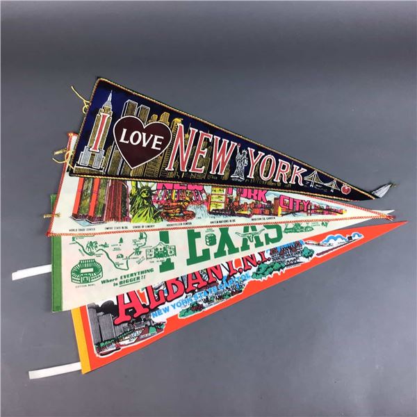 A Collection of Four Vintage Souvenir Felt Pennants Featuring New York and Texas Landmarks