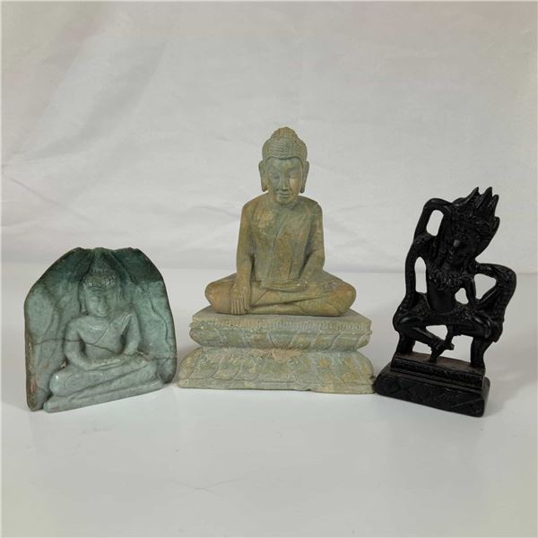 Three Southeast Asian Religious Figurines Including Carved Stone Buddha Statues and Wood Carved Camb