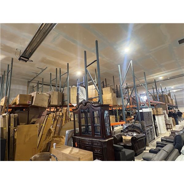 Assorted Commercial warehouse racking - includes  48 assorted vertical uprights from approx 14ft-18f