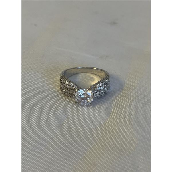 STERLING SILVER RING, MARKED 925 SIZE 9 IN GOOD CONDITION, FEW STONES MISSING