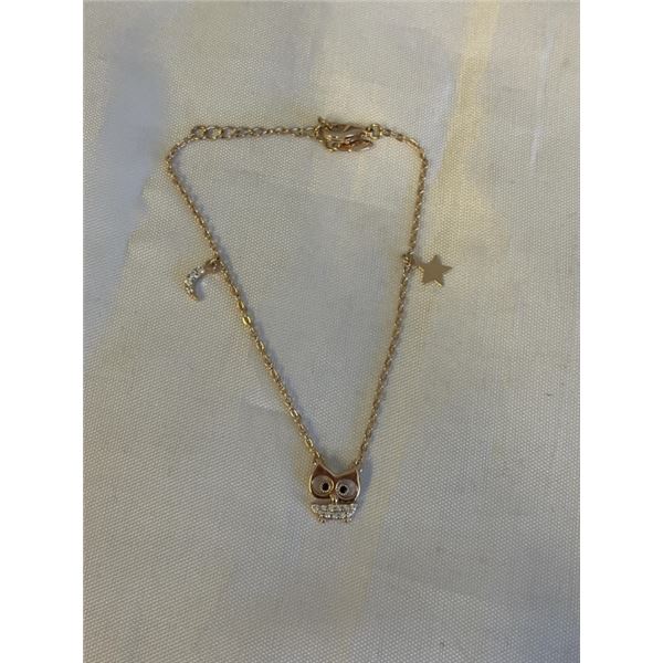 GOLD XP CHARM BRACELET