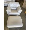 Image 1 : LIGHT BEIGE LEATHER CHAIR AND OTTOMAN