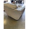 Image 3 : LIGHT BEIGE LEATHER CHAIR AND OTTOMAN