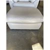 Image 5 : LIGHT BEIGE LEATHER CHAIR AND OTTOMAN