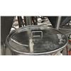 Image 2 : STAINLESS TRANSFER TANK ON WHEELS. APPROX 24"D X 30"H TANK + WHEELS. 40" TALL OVERALL.