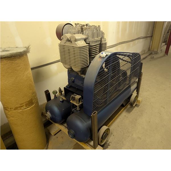 AIR COMPRESSOR WITH NO MOTOR. LOCATED ON 2ND FLOOR REQUIRES CRANE TO REMOVE