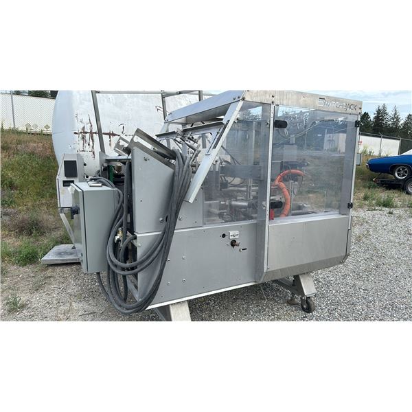 SWITCHBACK 15 PACKER BREW PACK JUNIOR. LOADS AND SEALS WITH HOT GLUE. ON WHEELS. NOT IN USE.