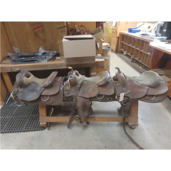 3 Well-Enjoyed Western Saddles